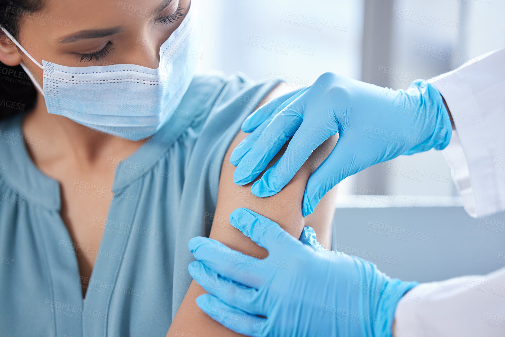 Buy stock photo Patient, face mask and doctor hands for injection of virus cure for vaccination, pandemic or immunity. Person, arm and  gloves in hospital with ppe protection for 	Influenza bacteria, safety or shot