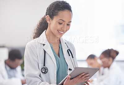 Buy stock photo Happy woman, doctor and research with tablet for browsing, news or medical information at hospital. Female person or healthcare employee with smile on technology for Telehealth or online discovery