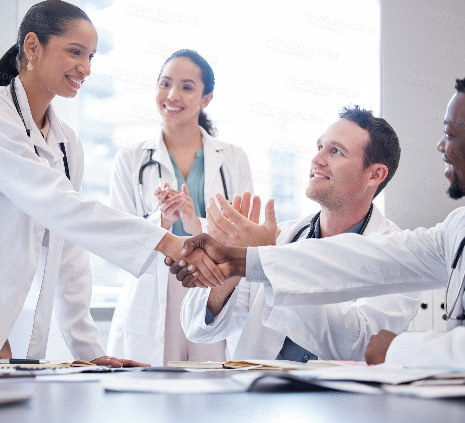 Buy stock photo Doctors, staff or meeting with handshake, applause or congratulations with healthcare innovation, wellness or opportunity. Group, team or coworkers clapping, shaking hands or partnership with growth 