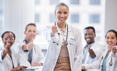 Buy stock photo Happy woman, portrait and doctor with thumbs up in meeting for teamwork, success or approval at hospital. Female person, medical employee or group with smile, like emoji or yes sign for agreement
