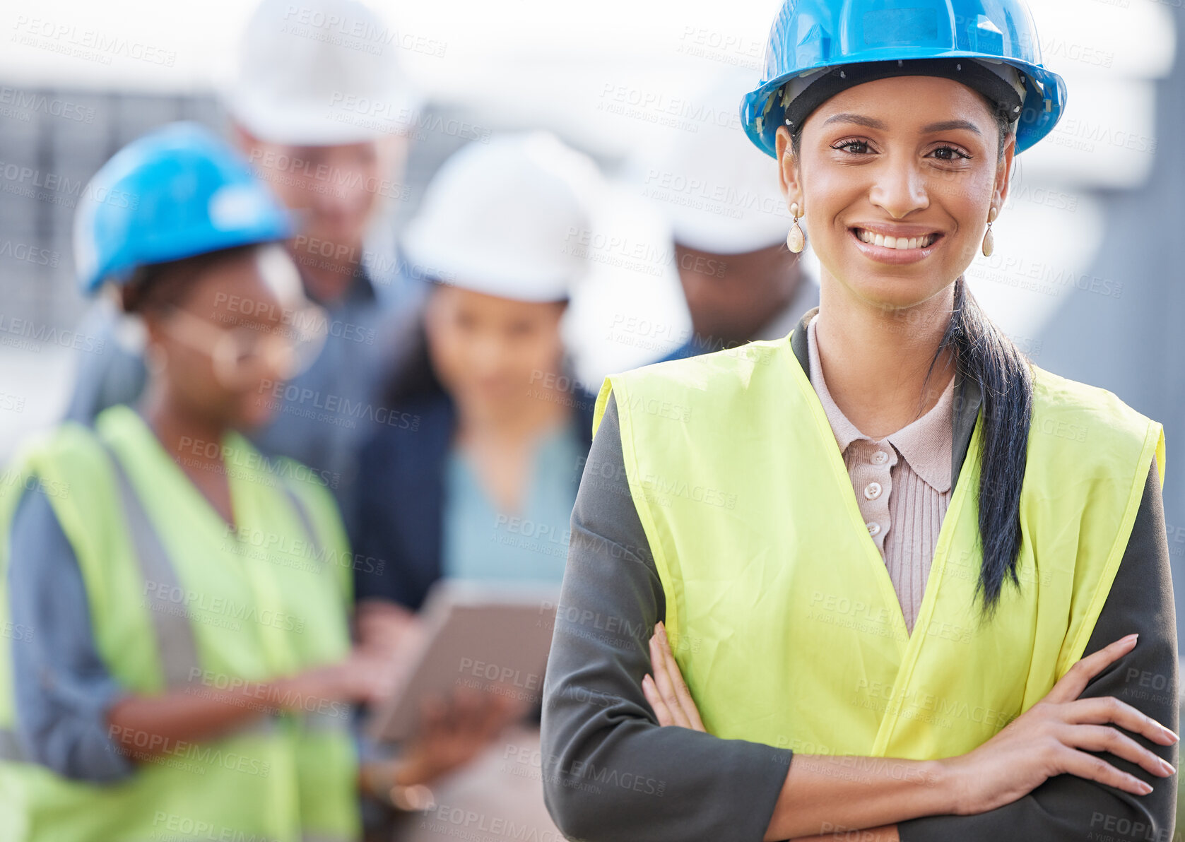 Buy stock photo Shot of a young woman working at a construction site