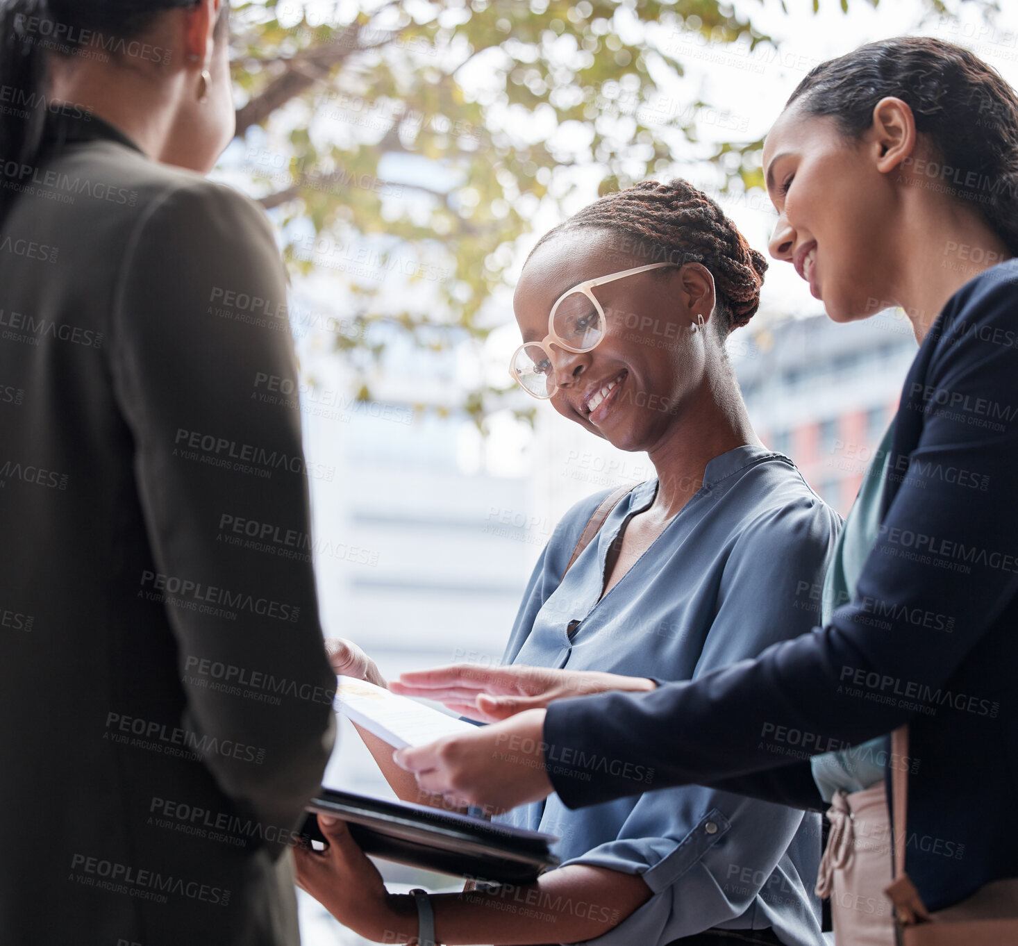 Buy stock photo Meeting, city and business women with documents for planning, discussion and in conversation. Professional, corporate team and people in town with paperwork for talking, communication and networking