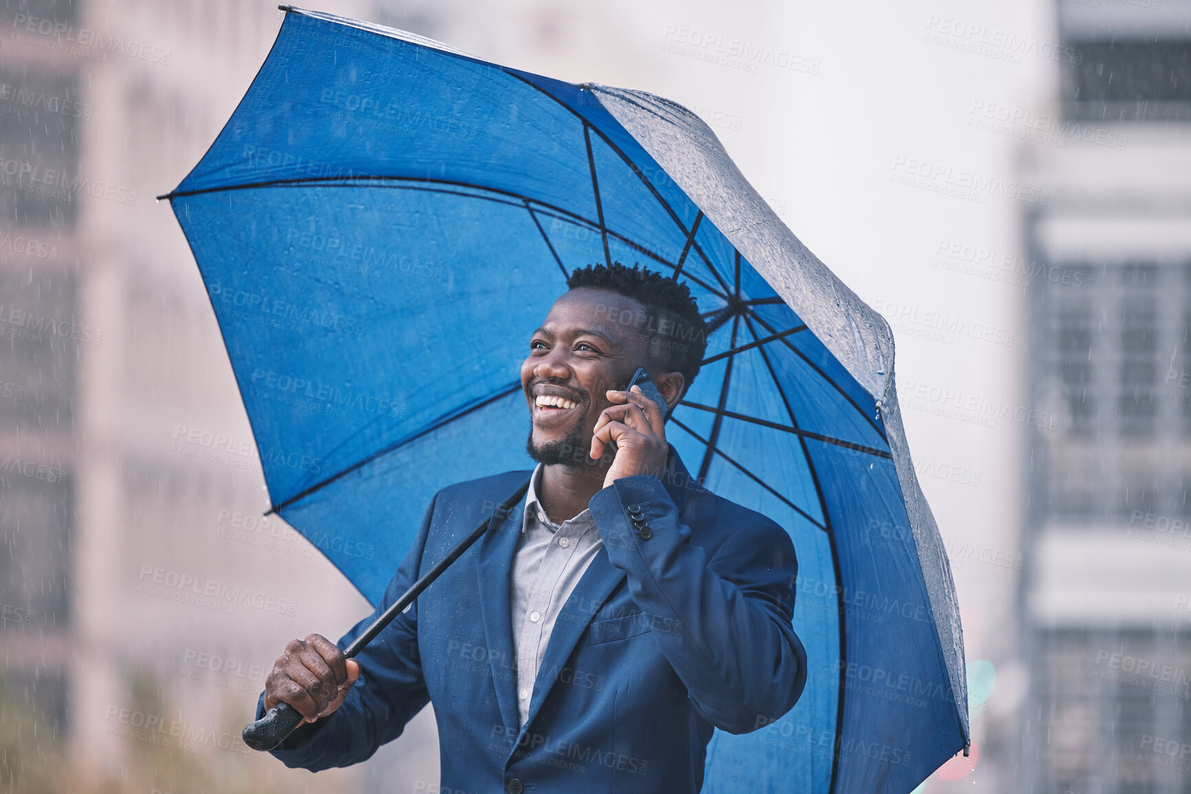 Buy stock photo Phone call, business and black man in city, umbrella and communication with rain, smile and connection. Weather, African person and agent with smartphone, cover and network with app, outdoor and wet