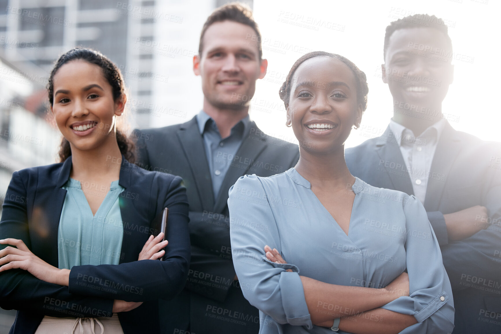 Buy stock photo Portrait, outdoor and business people with pride for teamwork, lens flare and cooperation with solidarity. Corporate staff, crossed arms and support in city with collaboration and confident group