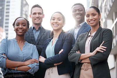 Buy stock photo Diversity, portrait of businesspeople and arms crossed with smile outdoors against a city background with a lens flare. 
Teamwork, collaboration and happy colleagues standing together smiling