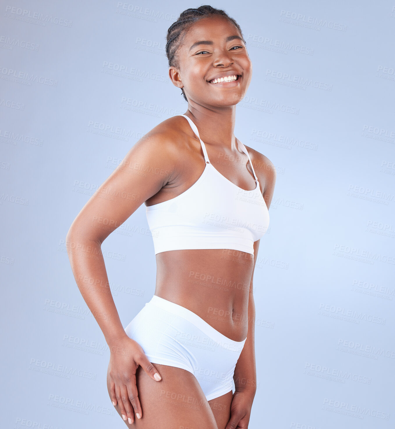 Buy stock photo Happy black woman, portrait and weight loss with underwear for diet or nutrition on a blue studio background. African, female person or model with smile in detox for slim body, health and wellness