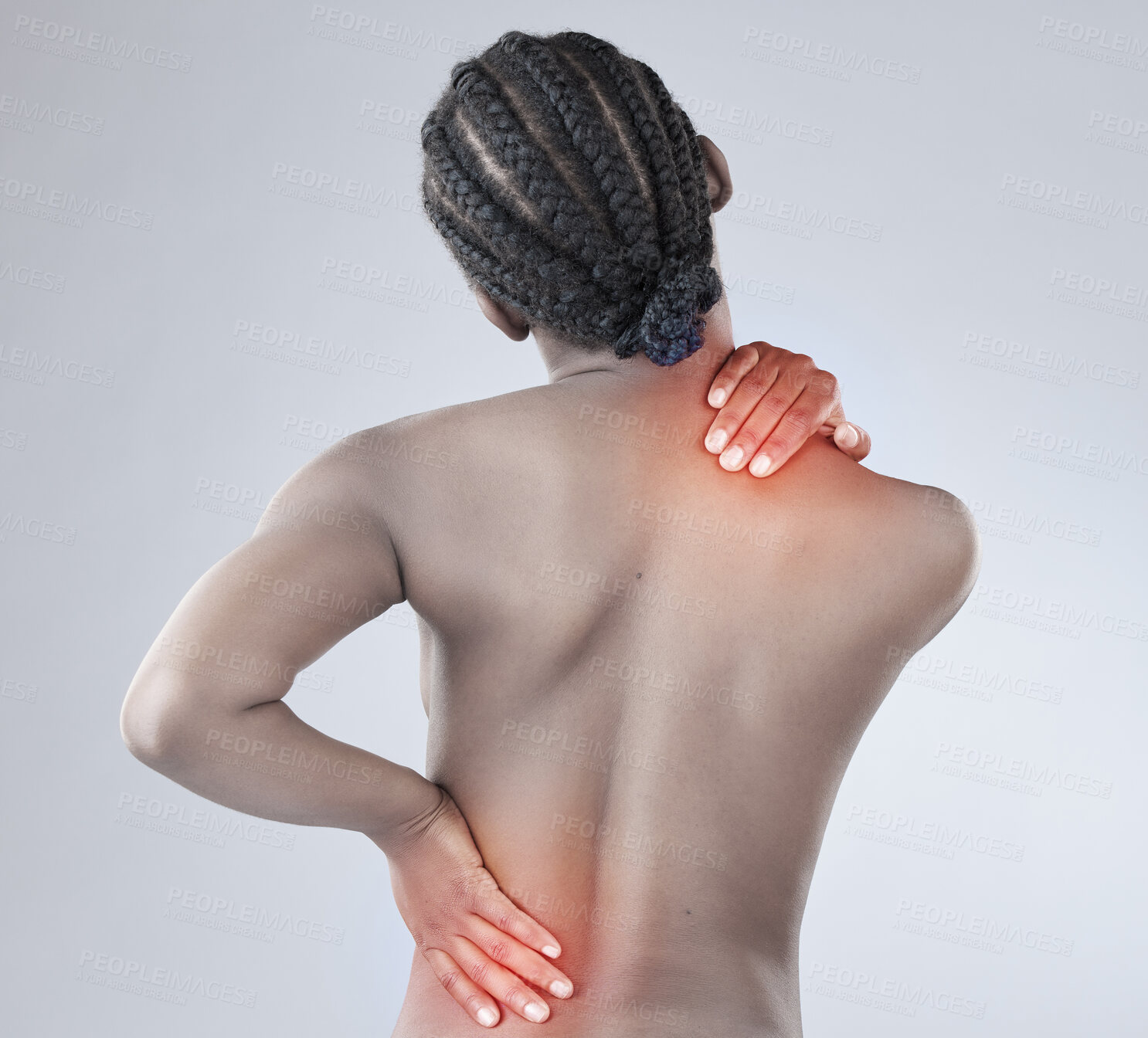 Buy stock photo Black woman, back pain and injury with inflammation from tension, sore muscle or accident on a gray studio background. Rear view of African female person with red glow for body ache or spinal problem