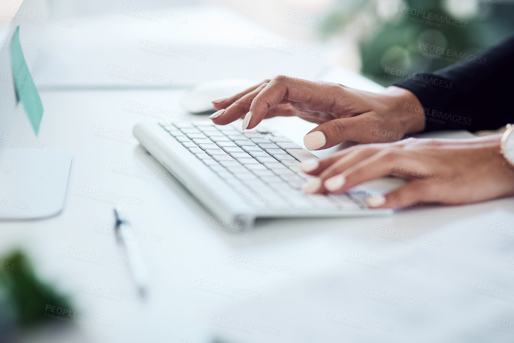 Buy stock photo Closeup shot of an unrecognisable businesswoman typing on a computer keyboard in an office