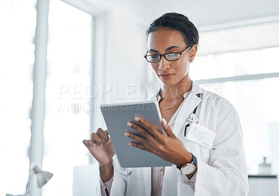 Buy stock photo Digital tablet, research and women doctor at hospital for planning, schedule and management. Healthcare, app and female physician online for internet, search and results while reading medical news