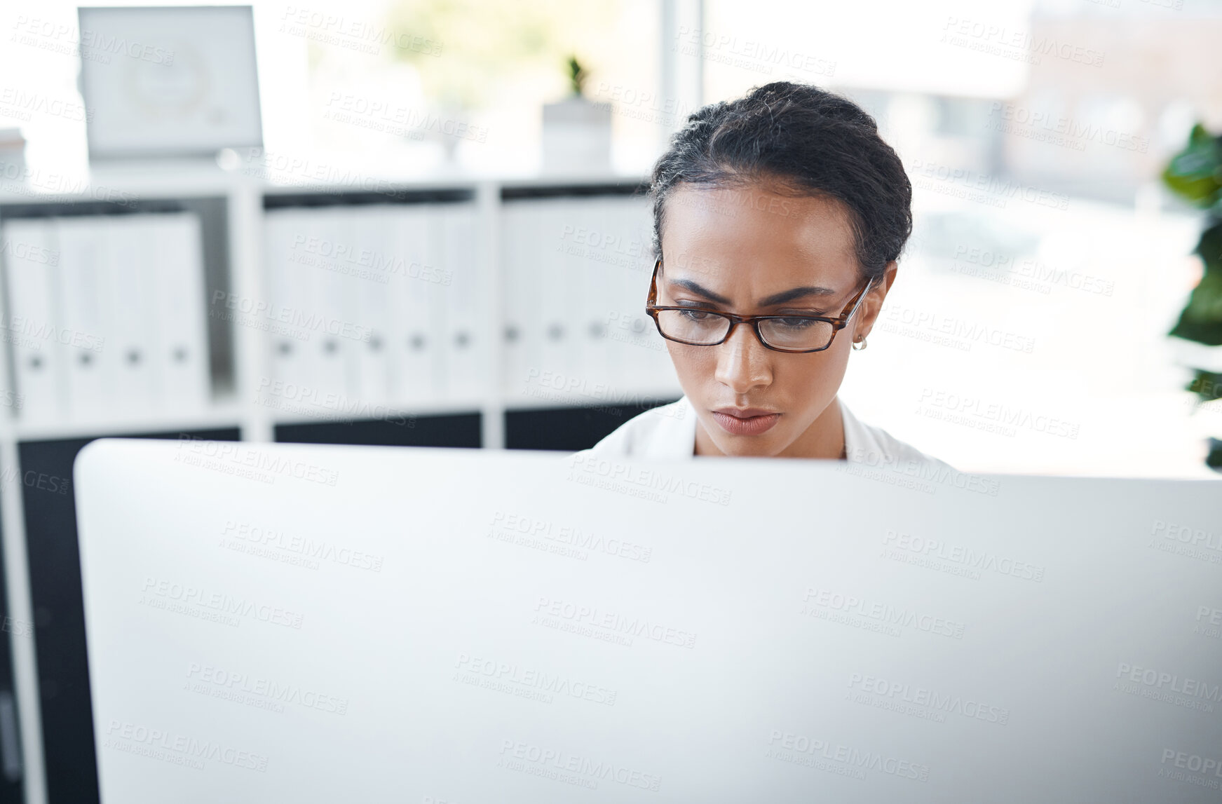 Buy stock photo Computer, woman and physician in hospital for healthcare, health and wellness in clinic. Online research, medical article or professional doctor writing report, telehealth or digital consultation