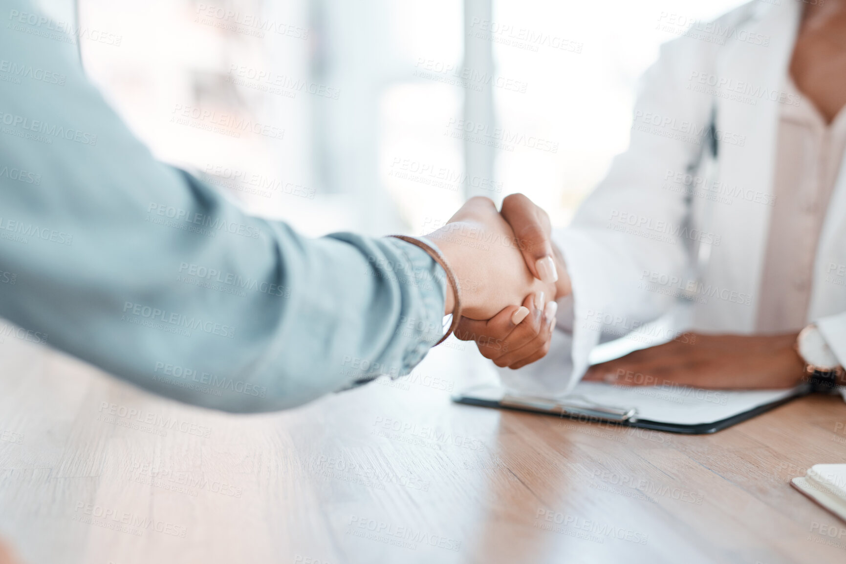 Buy stock photo Patient, doctor and meeting with handshake for appointment, checkup or agreement on medical aid at office. Closeup of person shaking hands with healthcare employee for health insurance or thank you