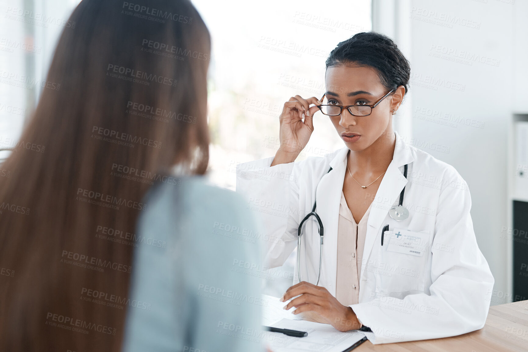 Buy stock photo Doctor, patient and woman for consultation in office with discussion, gynecology checklist and medical advice. People, healthcare and documents for exam results, fertility clinic and surgery planning