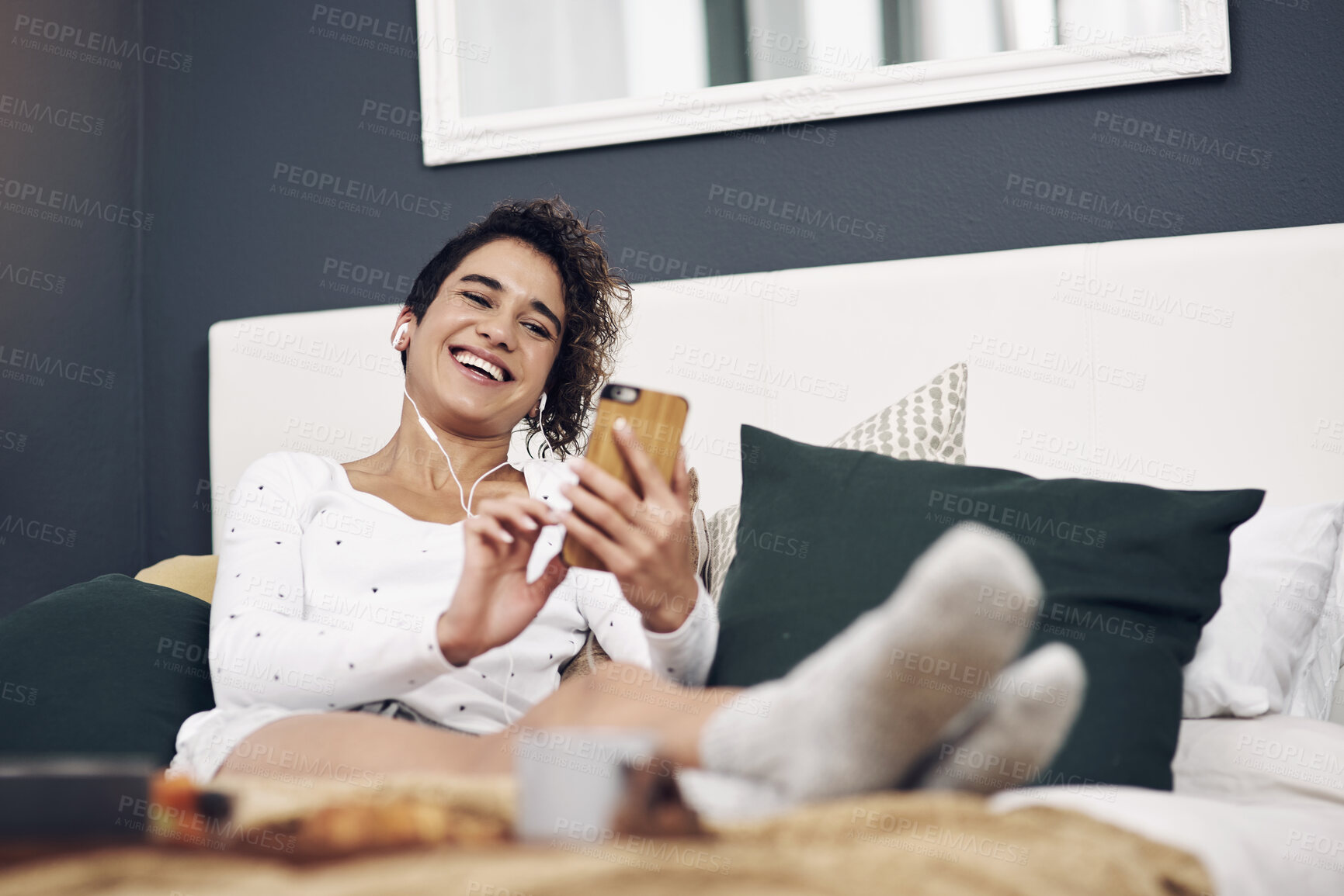 Buy stock photo Bedroom, typing and woman with cellphone, breakfast and smile with social media, digital app and connection. Home, bed and girl with smartphone, message and contact with network, text or online news