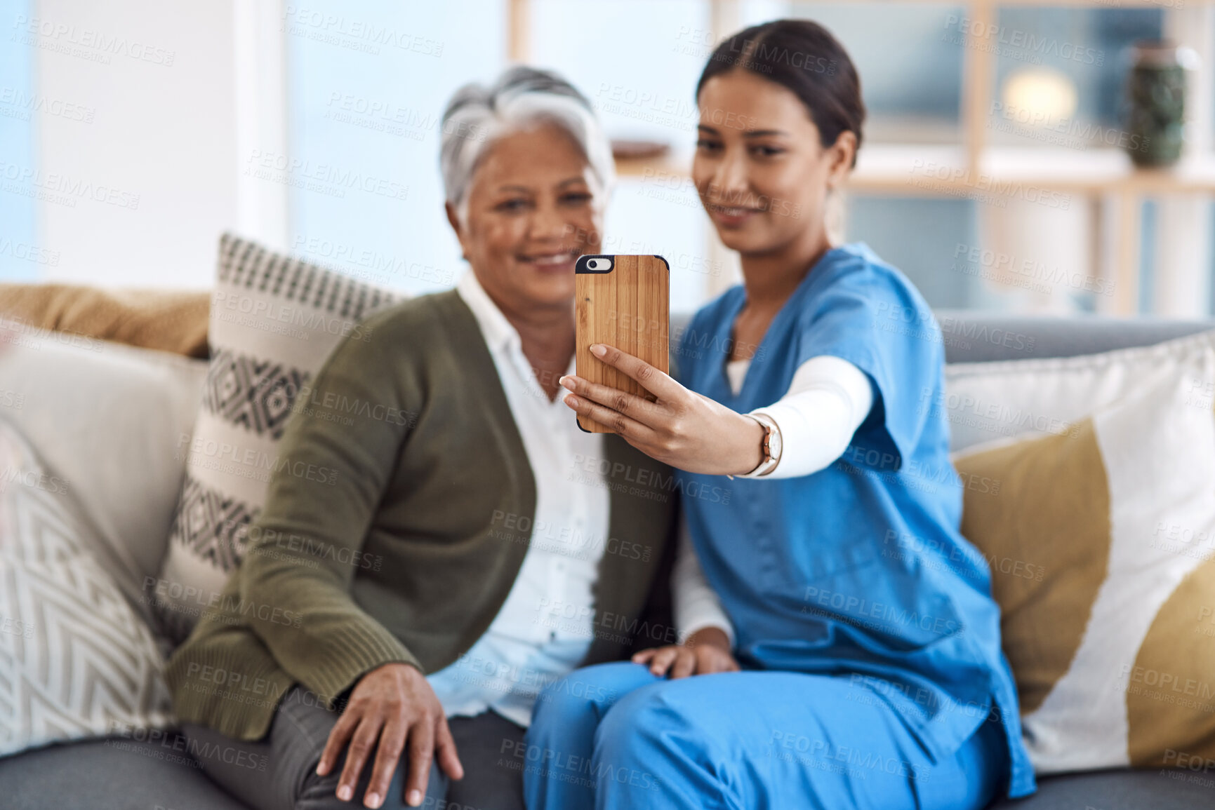 Buy stock photo Caregiver, phone selfie or old woman in nursing home with smile or happiness for profile pictures or retirement. Women, mobile photography or happy nurse smiling with elderly patient for wellness 