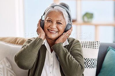 Buy stock photo Portrait, house and old woman with headphones, streaming music or retirement with audio or listening to radio. Face, senior person or relax with pensioner or headset with podcast, smile or sound