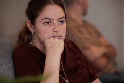 Buy stock photo Shot of a young couple ignoring one another during a fight