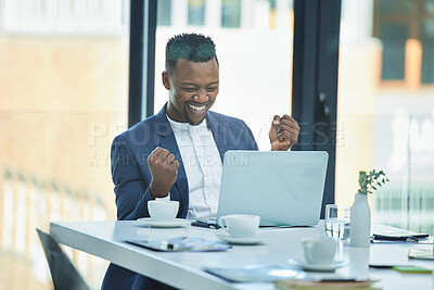 Buy stock photo Shot of a young businessman pumping his fists in excitment