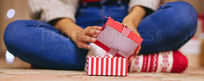 Buy stock photo Christmas, unboxing and present in hands of person on holiday or giving a gift on vacation. Home, celebration and ribbon on box with surprise, giveaway or open offering closeup on xmas morning