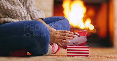 Buy stock photo Christmas, unboxing and gift in hands of person on holiday or giving a present on vacation. Home, celebration and ribbon on box with surprise, giveaway or open package closeup on xmas morning