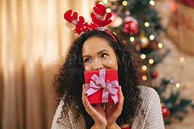 Buy stock photo Woman, thinking and surprise gift on Christmas and person giving present on holiday or vacation. Happy, celebration and ribbon on box with secret giveaway or offering package on xmas morning in home