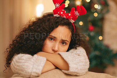 Buy stock photo Portrait, sad woman and depression on Christmas in home with anxiety, worry and emotional crisis. Face of lonely female person feeling unhappy, bored and disappointed in festive holiday with headband