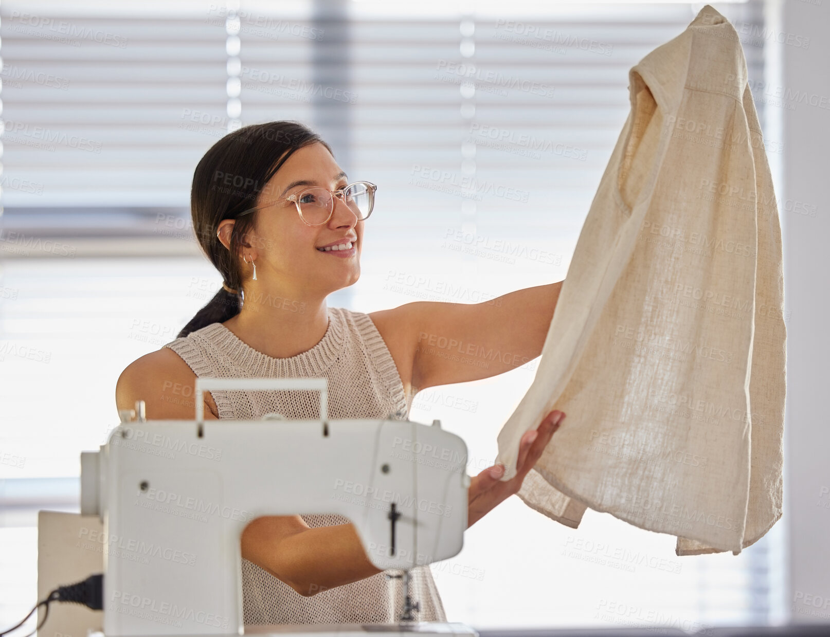 Buy stock photo Happy, woman and tailor with shirt in apartment for small business, fashion design and pride. Female seamstress, smile and fabric in home workshop for production, clothing and sewing for boutique 