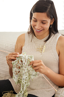 Buy stock photo Woman, happy and knitting at home for art, handcraft and gifting for decor, small business or hobby in lounge. Female person, smile and design with pattern for relax, peace and creativity as designer