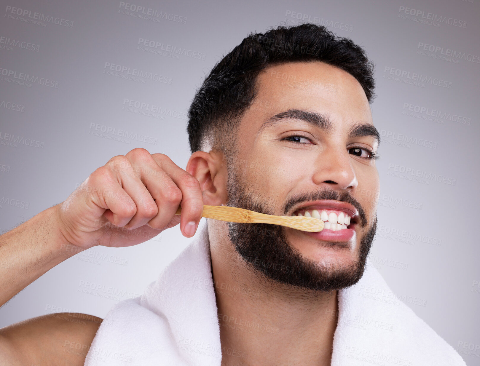 Buy stock photo Man, smile and cleaning with toothbrush in studio for oral hygiene, mouth care and gum health. Morning routine, person and hand with dental product for fresh breathe, protection and cavity prevention