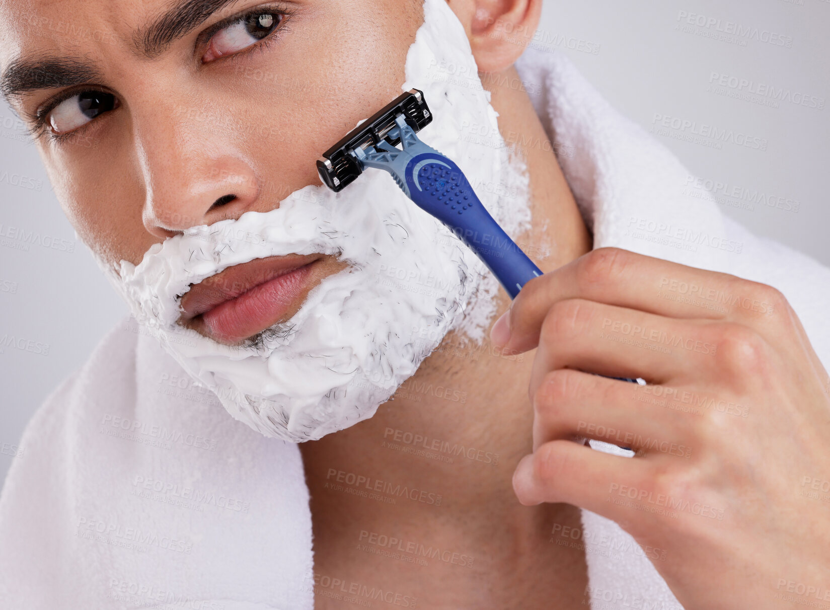 Buy stock photo Hair removal, shaving and foam with man in studio for beauty, grooming or skincare. Cosmetics, self care and shower with face of male model and razor blade on gray background for cleaning and product