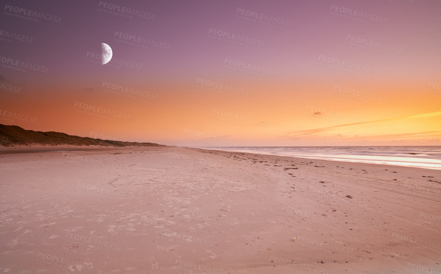 Buy stock photo Copy space at sea with moon in the twilight night sky and calm ocean waves across a relaxing beach shore. Scenic and peaceful panoramic of a beautiful sunset with lunar background and empty landscape