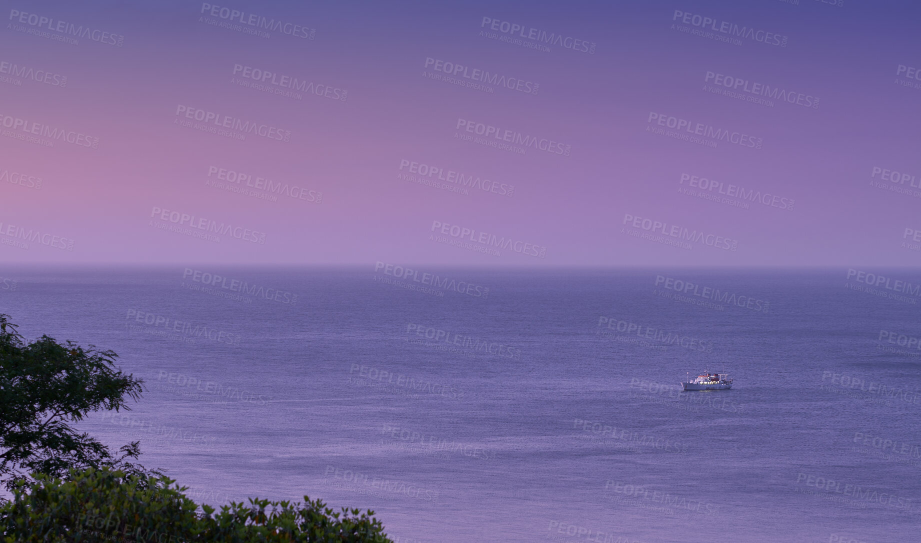 Buy stock photo Beautiful sunset view of an open sea, purple sky and the horizon outdoors with copy space. Calm and relaxing ocean scene in the early evening. A colorful seascape with a yacht or sailboat in summer