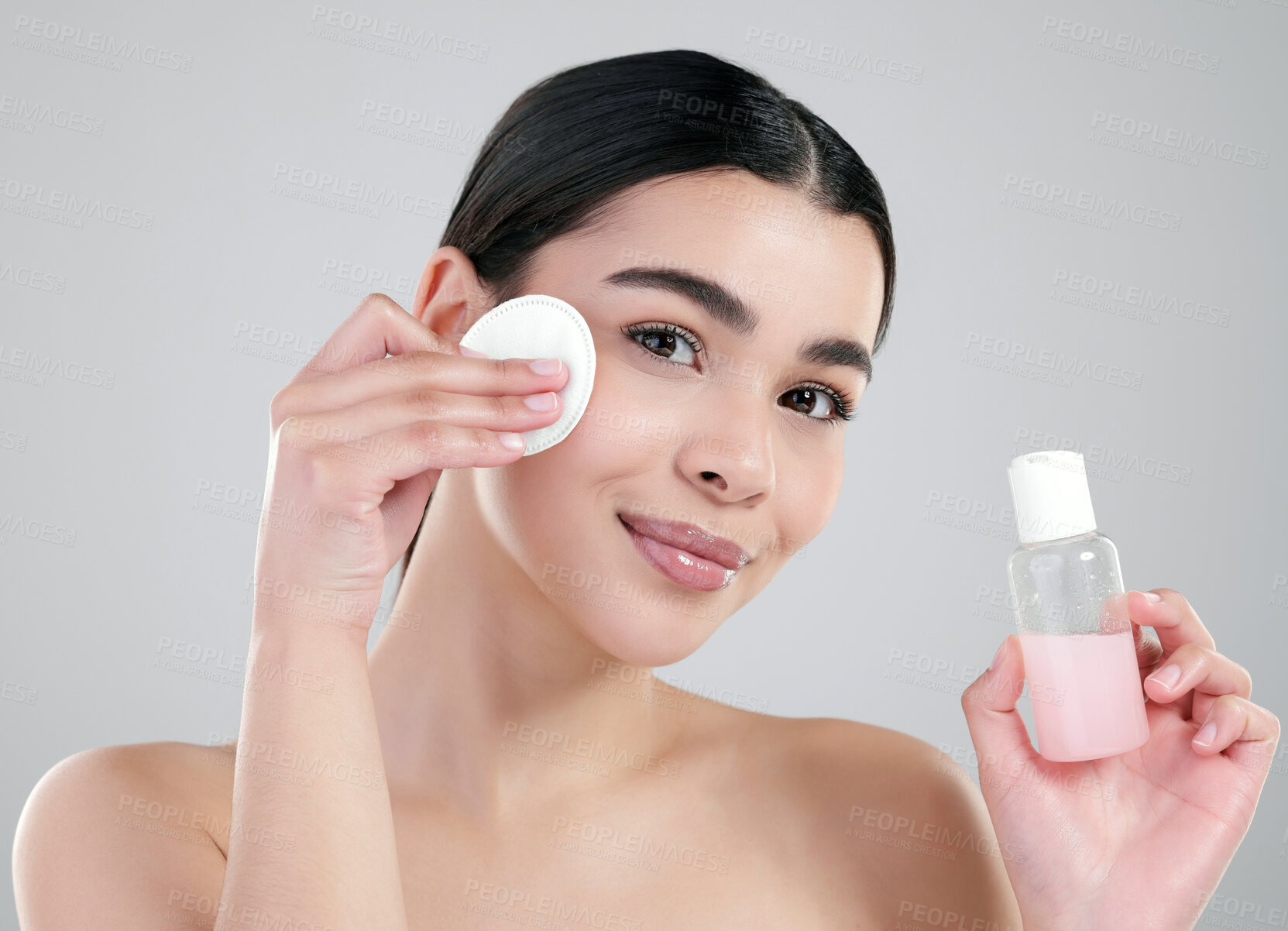 Buy stock photo Happy woman, portrait and skincare with pad or container for exofliation or facial on a white studio background. Face of female person with cotton for applying beauty, grooming or makeup removal
