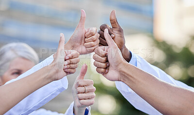 Buy stock photo Doctor, thumbs up and hands together for thank you, emoji and yes hand sign with motivation. Goal, success and collaboration of healthcare and and wellness group with winner and support gesture