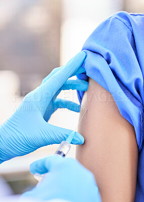 Buy stock photo Shot of an unrecognizable doctor giving a patient an injection at a hospital