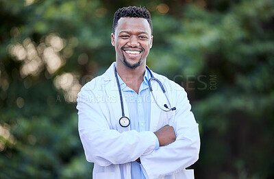 Buy stock photo Black man, doctor portrait and arms crossed of healthcare and wellness professional outdoor. Success, motivation and African male person in nature with a smile from career confidence and work