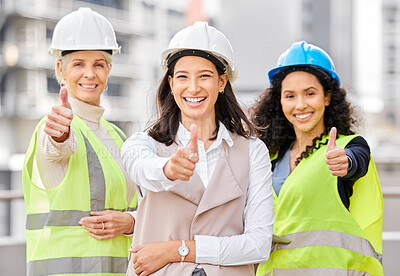 Buy stock photo Cropped portrait of three attractive female engineers giving thumbs up while standing outside on a construction site
