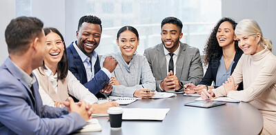 Buy stock photo Shot of a team of businesspeople having a meeting