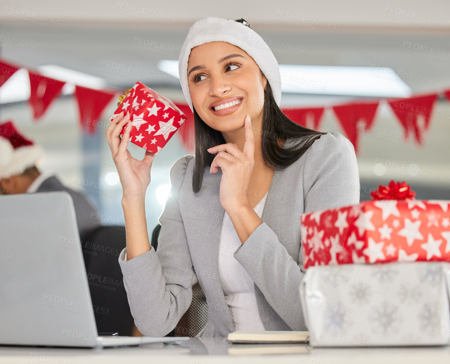 Buy stock photo Business, curious and woman with Christmas gift, smile and happiness with festive season, wonder and thinking. Person, professional or consultant with Xmas present, guessing or celebration with smile