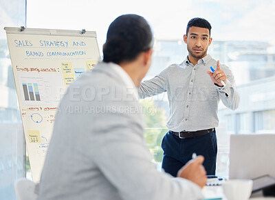 Buy stock photo Shot of businesspeople having a meeting in a boardroom at work