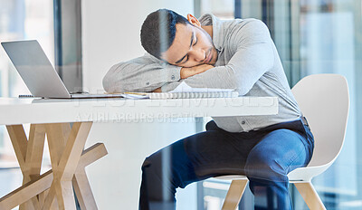 Buy stock photo Man, sleeping and tired in office at startup with burnout, exhausted and overworked at creative agency. Employee, person and rest with fatigue, overtime and overwhelmed with nap at desk in workplace