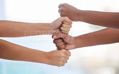 Buy stock photo Closeup shot of two unrecognisable women stacking their fists together