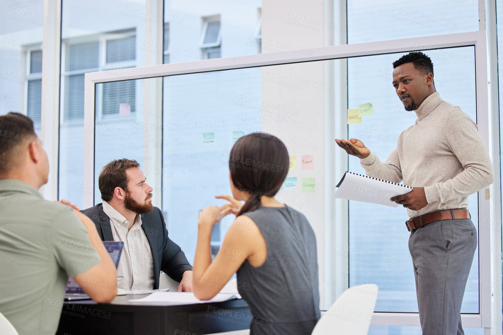 Buy stock photo Business people, man and presentation in meeting, paperwork and talking on company feedback. Boardroom, employees and coaching or speak on market research, planning and problem solving at training