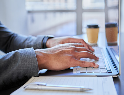 Buy stock photo Shot of a businessman using his laptop to do research