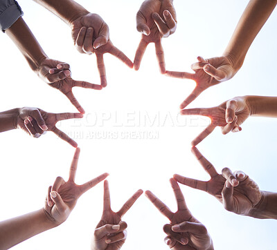 Buy stock photo Teamwork, hands and star of peace at white background for support, partnership and collaboration from below. Closeup, trust and fingers of hope, society and group solidarity for mission, goals or fun