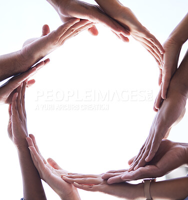 Buy stock photo Teamwork, hands and people in circle shape for collaboration, support and community from below on white background. Closeup, group and palms together for cooperation, trust and solidarity of workflow