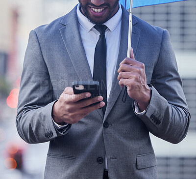 Buy stock photo Phone, search or businessman with umbrella in city for travel, chat or map guide for location tracking. Smartphone, rain or entrepreneur in London for job, opportunity or taxi service communication
