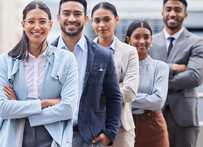 Buy stock photo Shot of a diverse group of businesspeople standing in a line