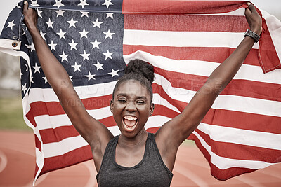 Buy stock photo Shot of a young female athlete celebrating her win while running with a flag
