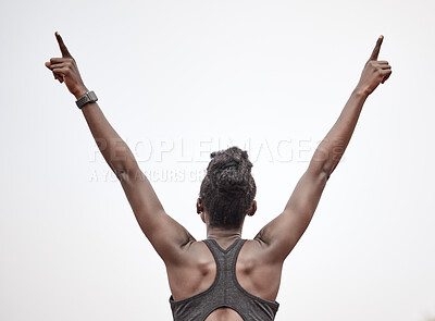 Buy stock photo Shot of a female athlete celebrating her run