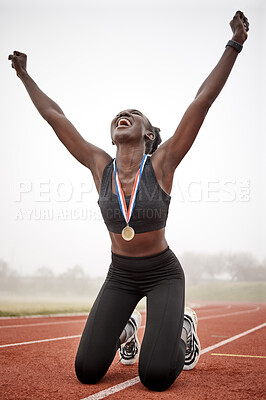 Buy stock photo Shot of a young female athlete celebrating her run